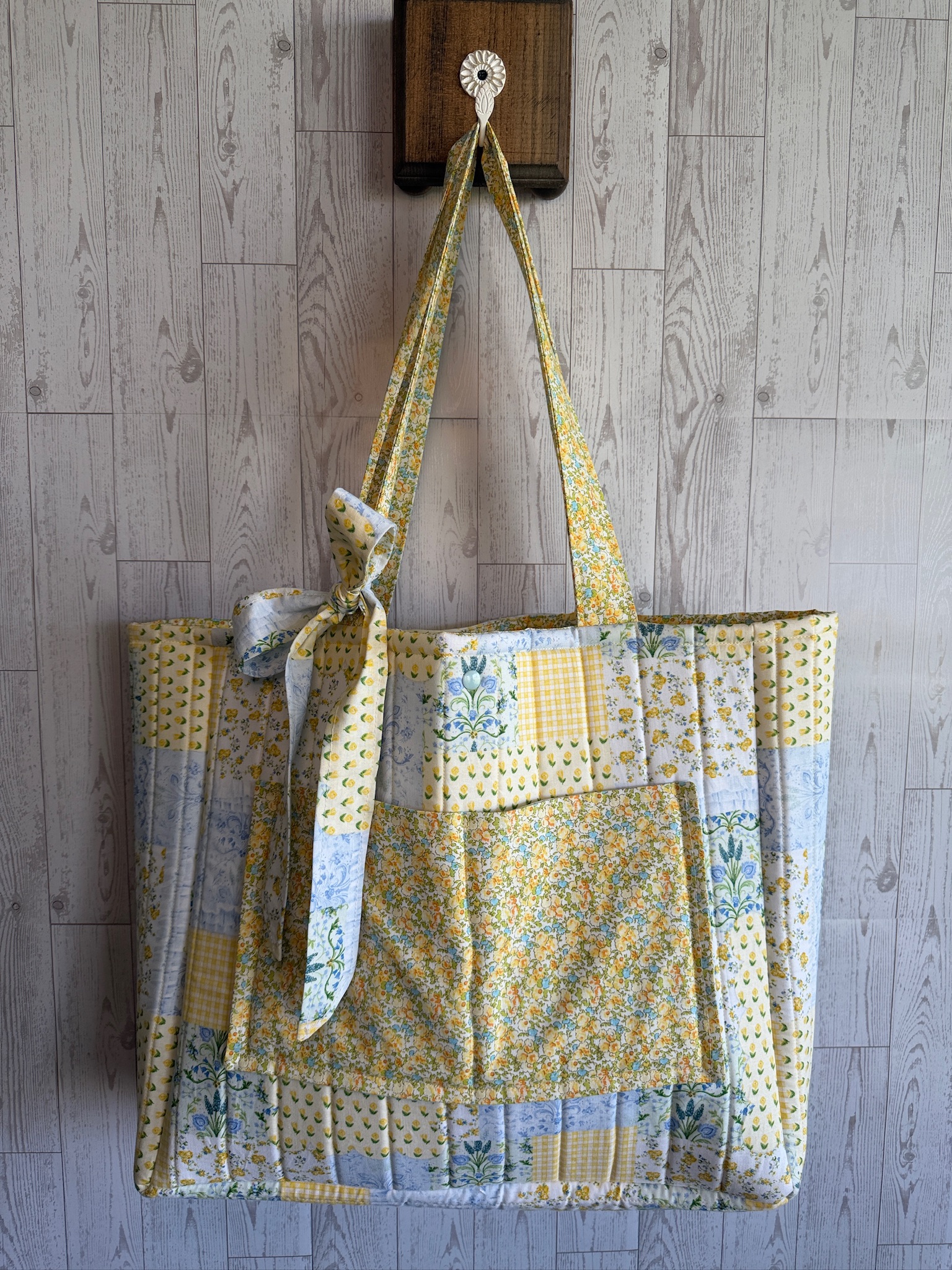 Large handmade patchwork market tote bag in yellow, blue and floral cotton prints